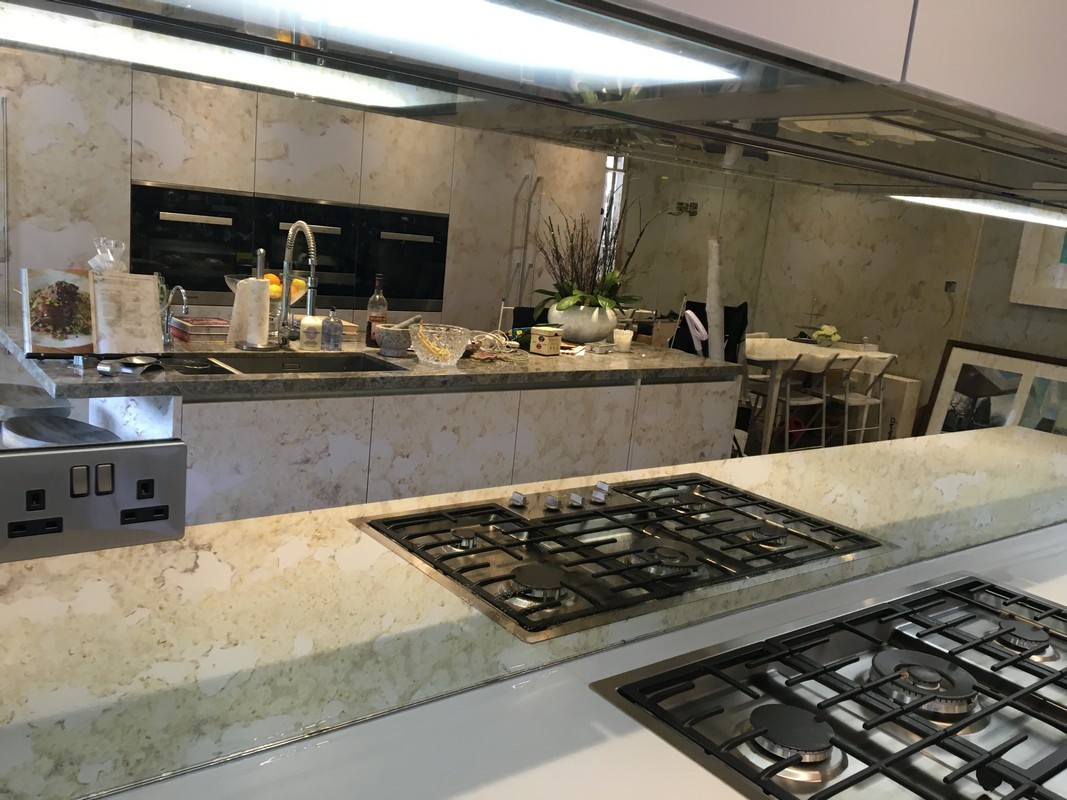 Mirror glass splashback in Wembley luxury kitchen
